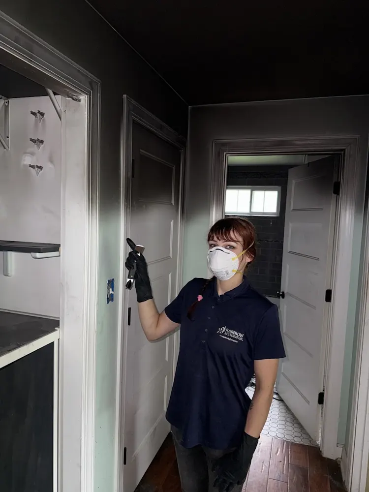 Pacific Coast Water & Flood Restoration technician in protective gear on a job in San Diego